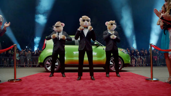 hamster mascots swagger from their flashy overhauled Kia Soul onto a red carpet